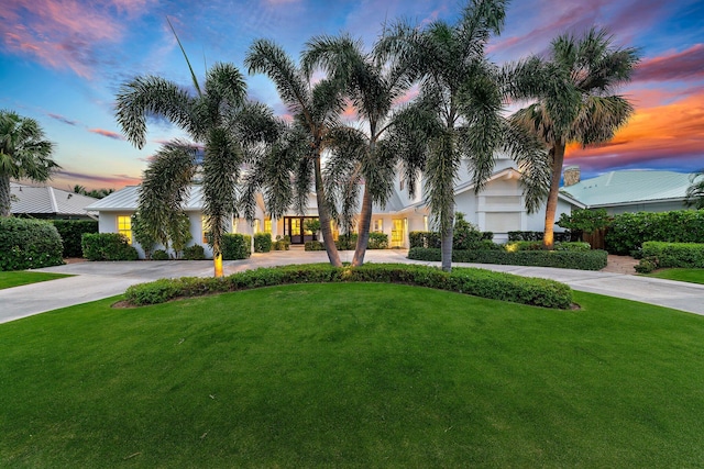 view of front of home with a yard