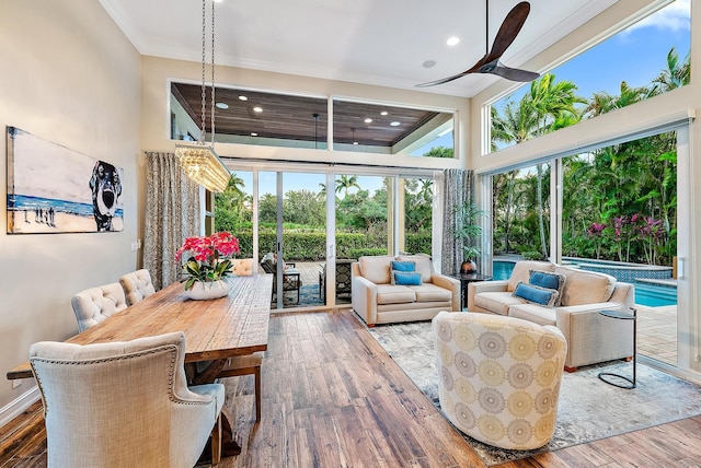 sunroom / solarium with ceiling fan