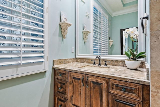 bathroom with vanity and crown molding