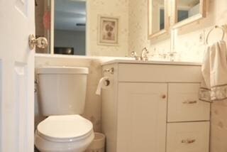 bathroom with vanity and toilet