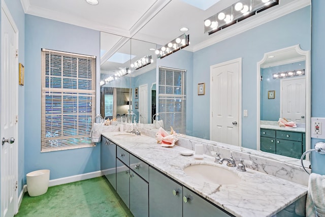 bathroom with double vanity, ornamental molding, and a sink