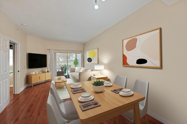 dining room with wood-type flooring