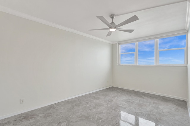 spare room featuring ceiling fan and ornamental molding