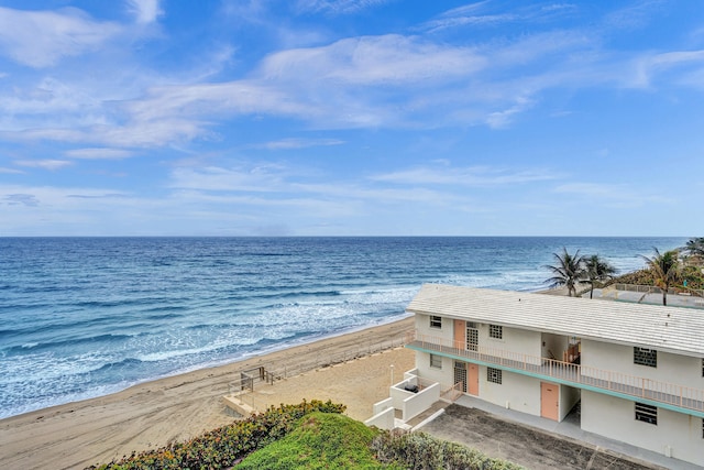 property view of water featuring a beach view