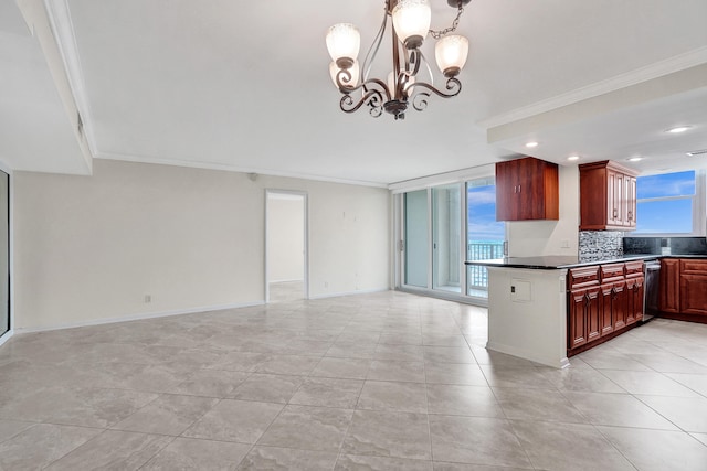 kitchen with decorative backsplash, crown molding, a chandelier, and decorative light fixtures