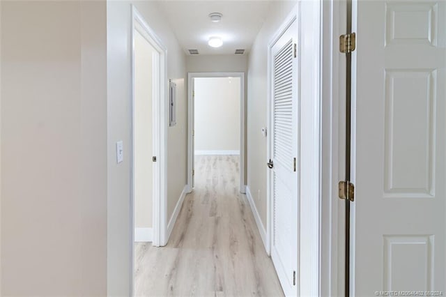 corridor featuring light hardwood / wood-style flooring