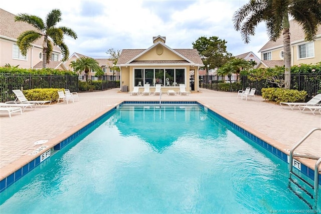 view of pool featuring a patio