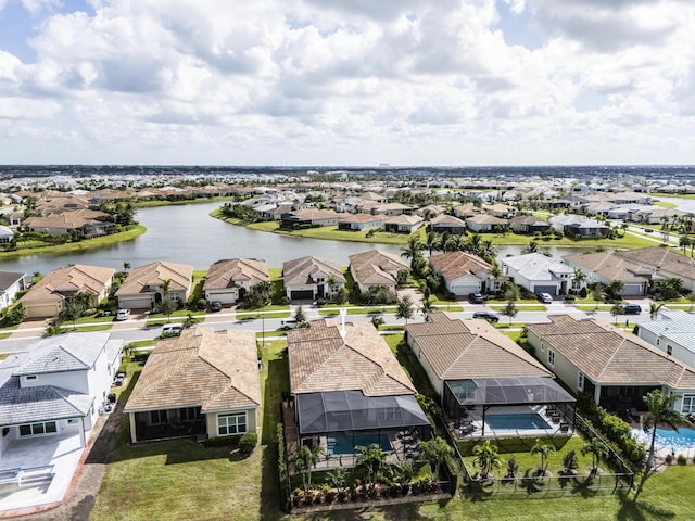 drone / aerial view with a water view