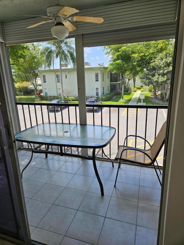 balcony featuring ceiling fan