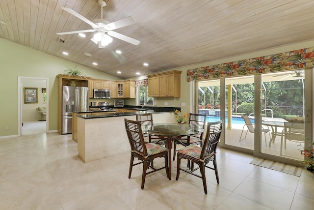 tiled dining area with ceiling fan, wooden ceiling, sink, and vaulted ceiling