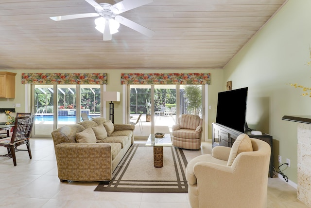 tiled living room with ceiling fan and wood ceiling