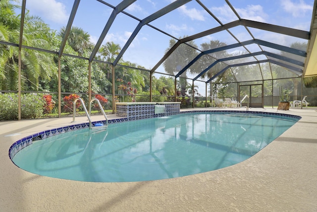 view of swimming pool with pool water feature, a lanai, and a patio area