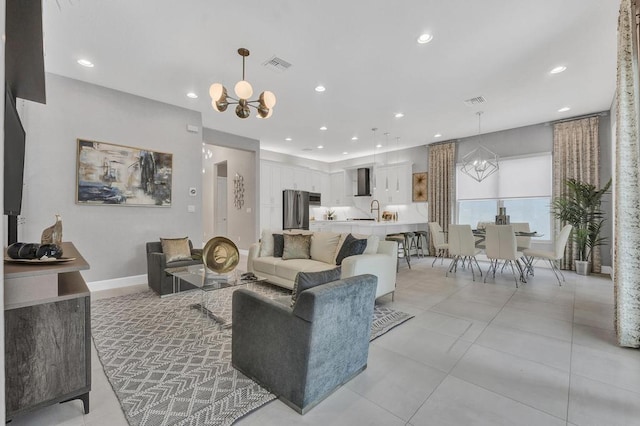 living room with an inviting chandelier