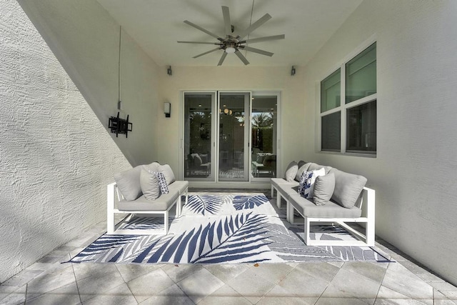 view of patio featuring outdoor lounge area and ceiling fan