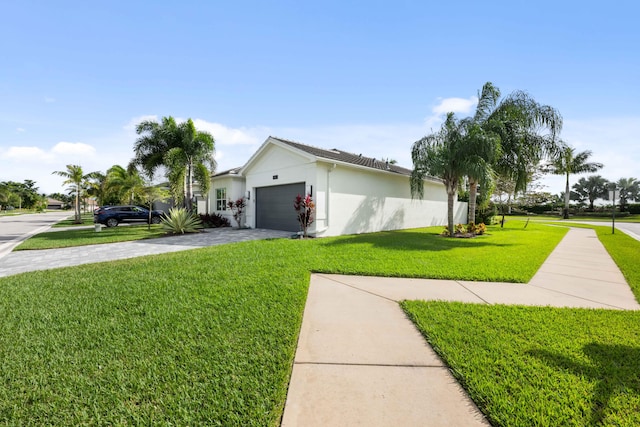 view of property exterior with a lawn and a garage