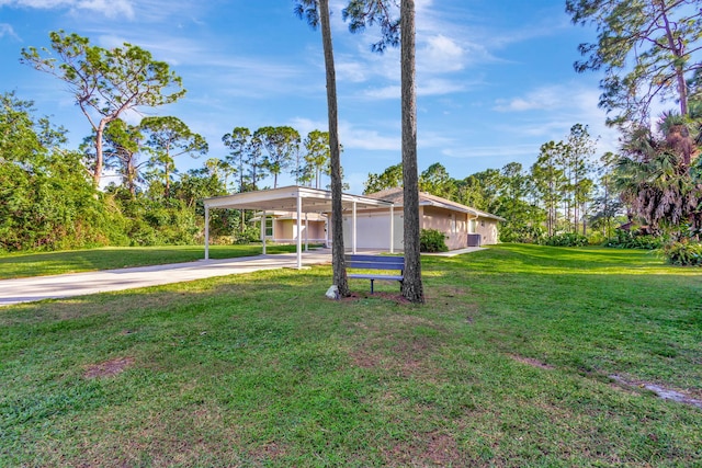 exterior space featuring a front yard and a carport