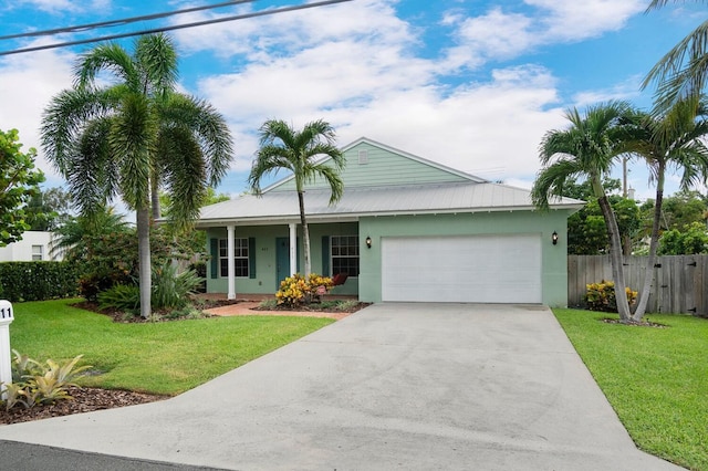 ranch-style home with a garage and a front lawn