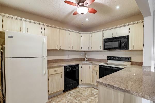 433 Pine Glen Ln Unit A2, Greenacres, FL 33463 - kitchen with black appliances, a textured ceiling, a peninsula, a ceiling fan, and light stone counters