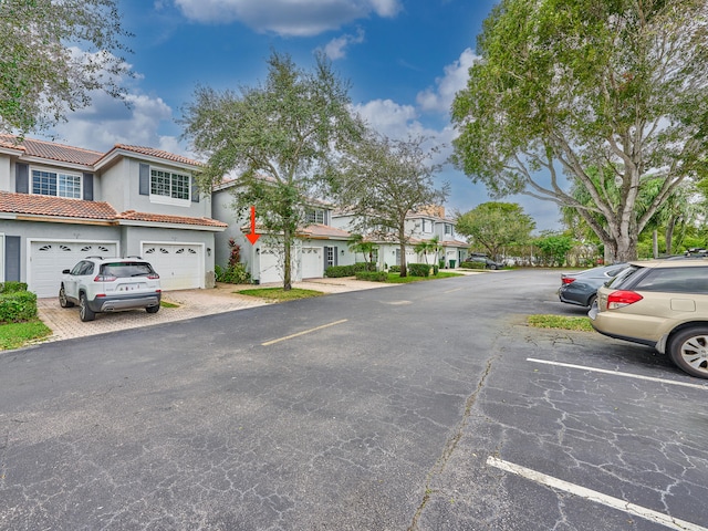 view of parking with a garage