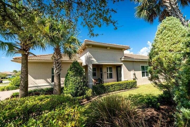 exterior space featuring a front lawn