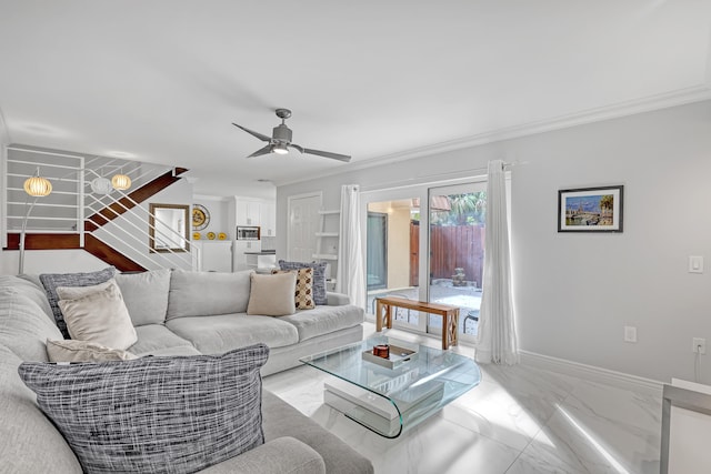 living room featuring ceiling fan and crown molding