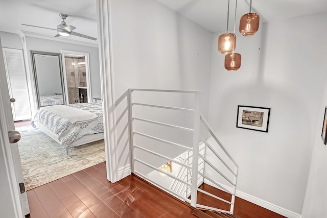 interior space featuring ceiling fan and hardwood / wood-style flooring