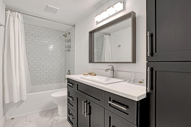 full bathroom featuring vanity, toilet, and shower / bath combo with shower curtain