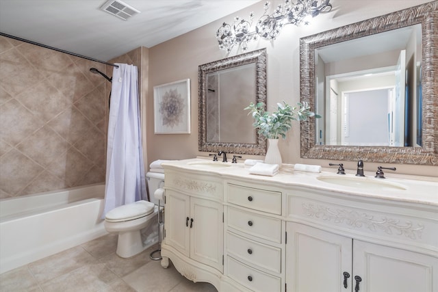 full bath with toilet, a sink, visible vents, and tile patterned floors