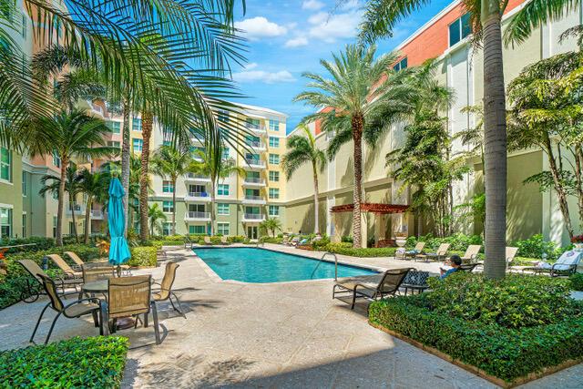 community pool with a patio