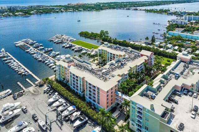 drone / aerial view with a water view and a city view