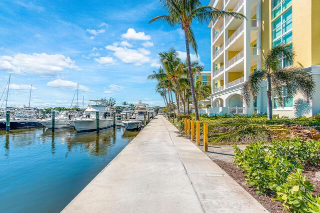 806 E Windward Way Unit 212, Lantana, FL 33462 - dock area featuring a water view