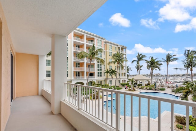 balcony featuring a water view