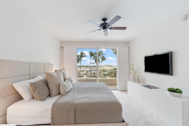 bedroom with access to exterior, light carpet, and ceiling fan