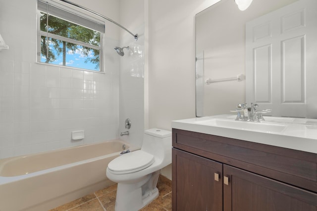 full bathroom with vanity, tile patterned floors, tiled shower / bath combo, and toilet