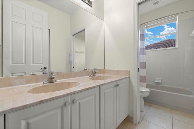 full bathroom with tile patterned flooring, vanity, toilet, and shower / bath combo with shower curtain