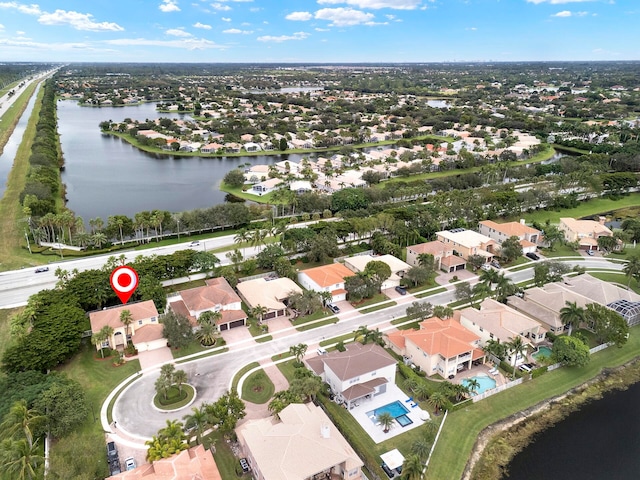 bird's eye view with a water view