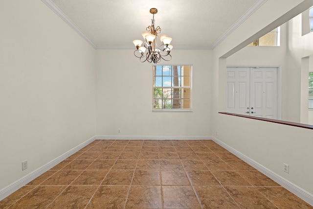 tiled empty room featuring a chandelier and crown molding