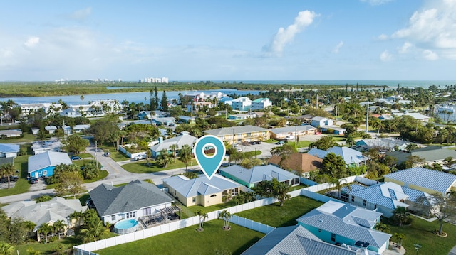 bird's eye view with a water view