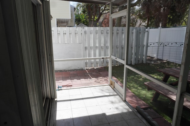 view of unfurnished sunroom