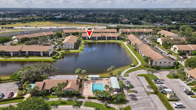 bird's eye view with a water view