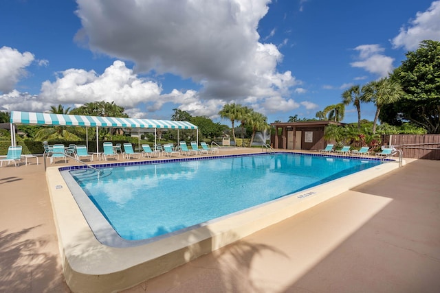 view of swimming pool featuring a patio area