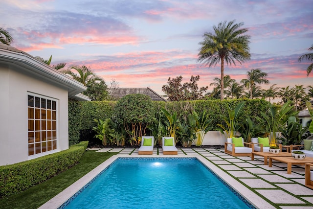 view of pool with pool water feature