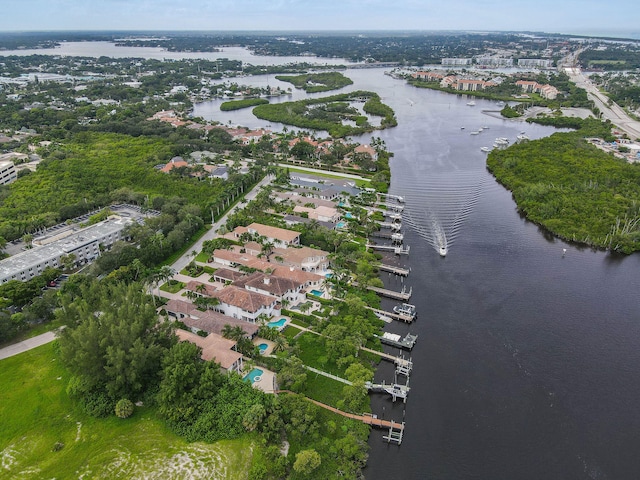 birds eye view of property featuring a water view