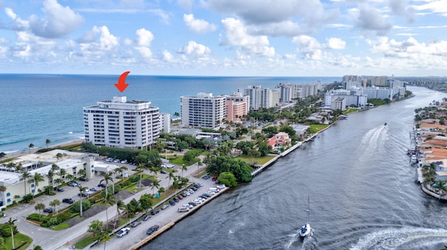 drone / aerial view with a water view