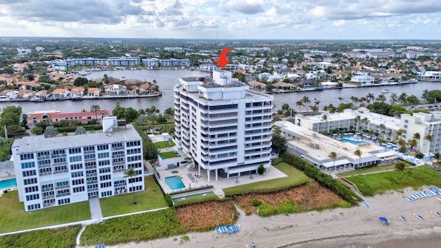 birds eye view of property featuring a water view