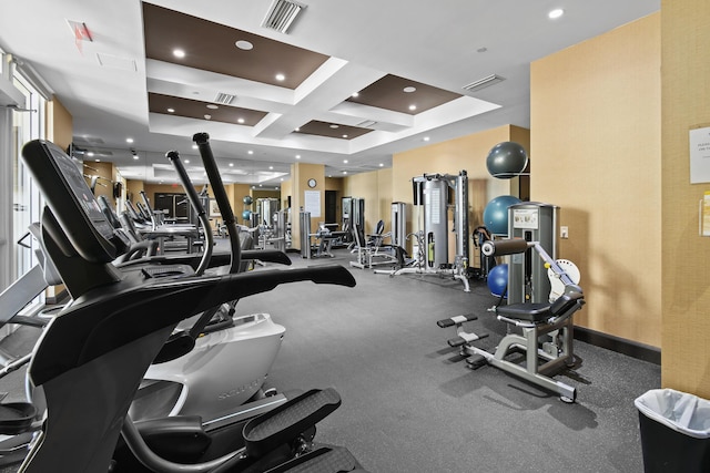 exercise room with coffered ceiling