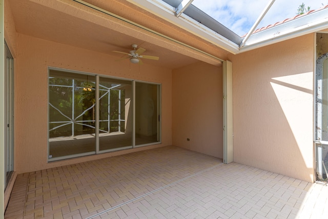 view of patio / terrace featuring ceiling fan