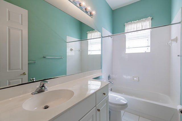 full bathroom with tile patterned flooring, vanity, tub / shower combination, and toilet