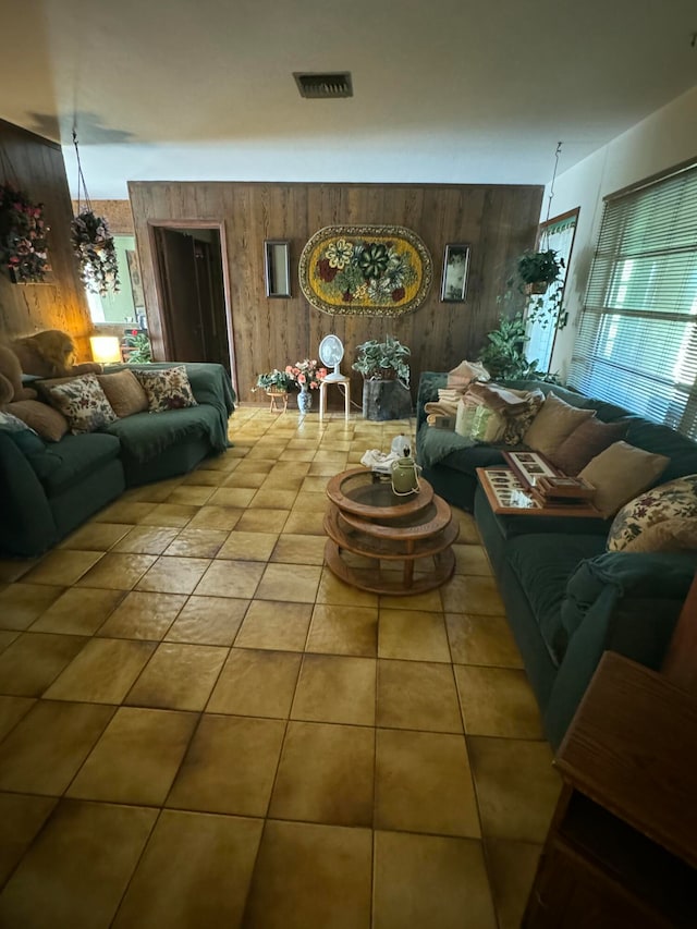 living room with wood walls