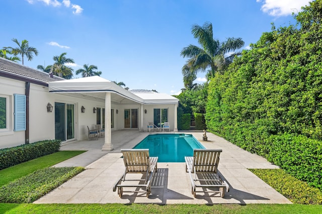 view of pool featuring a patio